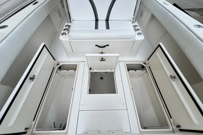 Slide: The Image of 2007 SeaVee 340B Open boat interior with storage compartments and seating. - 89