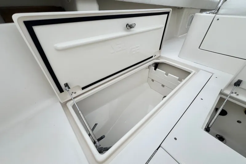 Slide: The Image of Open storage compartment on a 2007 SeaVee 340B Open boat. - 90