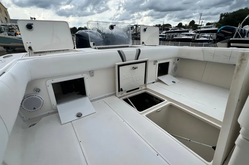 Slide: The Image of 2007 SeaVee 340B Open boat interior with open storage compartments and seating. - 108