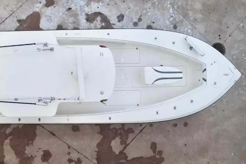 Slide: The Image of Top view of a 2007 SeaVee 340B Open boat on concrete surface. - 25