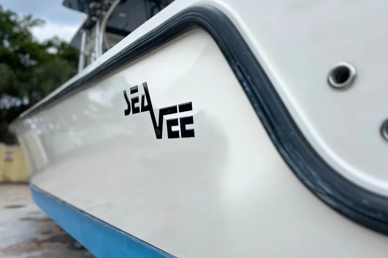Slide: The Image of 2007 SeaVee 340B Open boat side view with logo, featuring sleek design. - 18