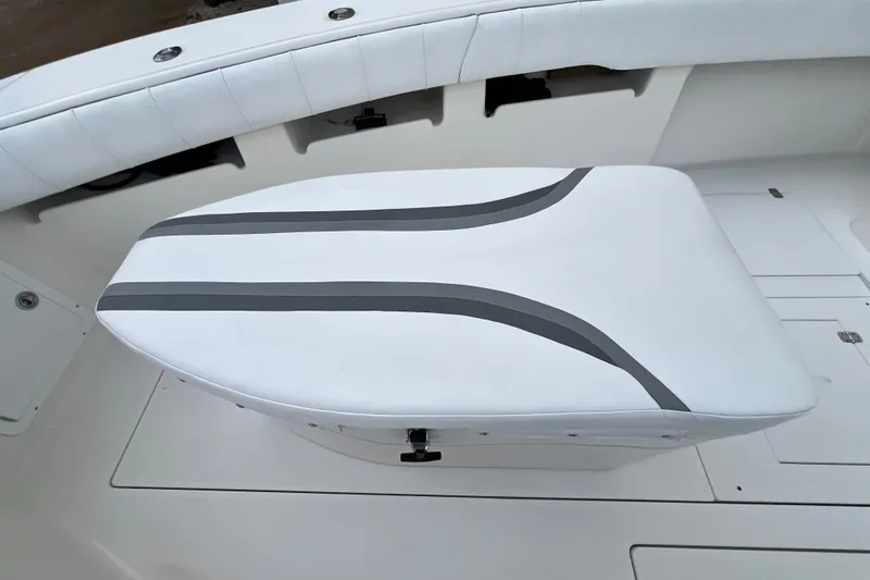 Slide: The Image of 2007 SeaVee 340B Open boat seat with sleek white and gray design. - 76