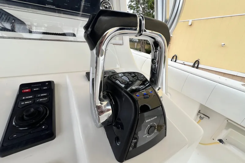 Slide: The Image of Close-up of 2007 SeaVee 340B Open boat controls with Yamaha throttle and Garmin system. - 39