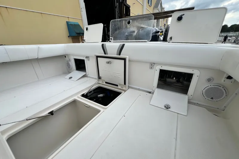 Slide: The Image of 2007 SeaVee 340B Open boat interior with storage compartments and seating. - 110