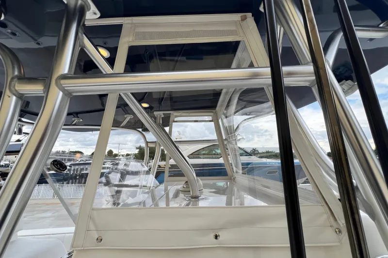 Slide: The Image of 2007 SeaVee 340B Open boat with stainless steel frame and clear canopy. - 100