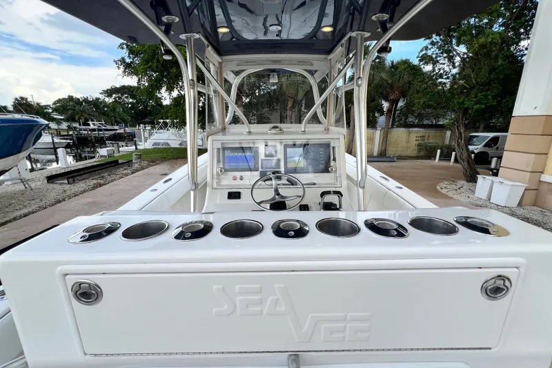 Slide: The Image of 2007 SeaVee 340B Open boat cockpit with steering wheel and control panel. - 45