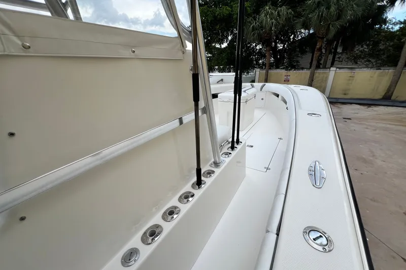 Slide: The Image of 2007 SeaVee 340B Open boat deck with rod holders and sleek design. - 60