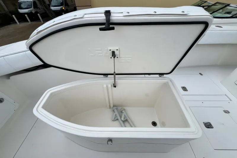 Slide: The Image of Open storage compartment on 2007 SeaVee 340B Open boat deck. - 77