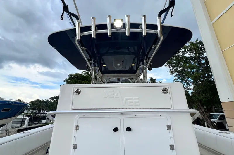 Slide: The Image of 2007 SeaVee 340B Open boat, rear view with T-top and rod holders. - 43