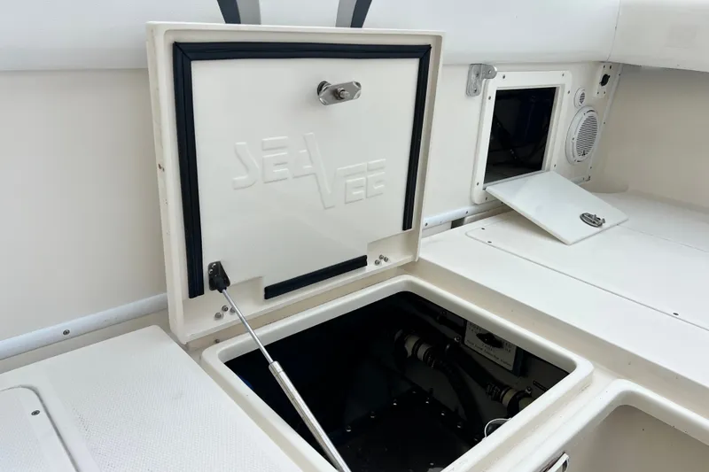 Slide: The Image of 2007 SeaVee 340B Open boat storage compartments and access hatches. - 109
