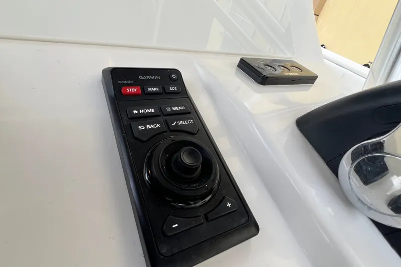Slide: The Image of Garmin control panel on 2007 SeaVee 340B Open boat dashboard. - 52