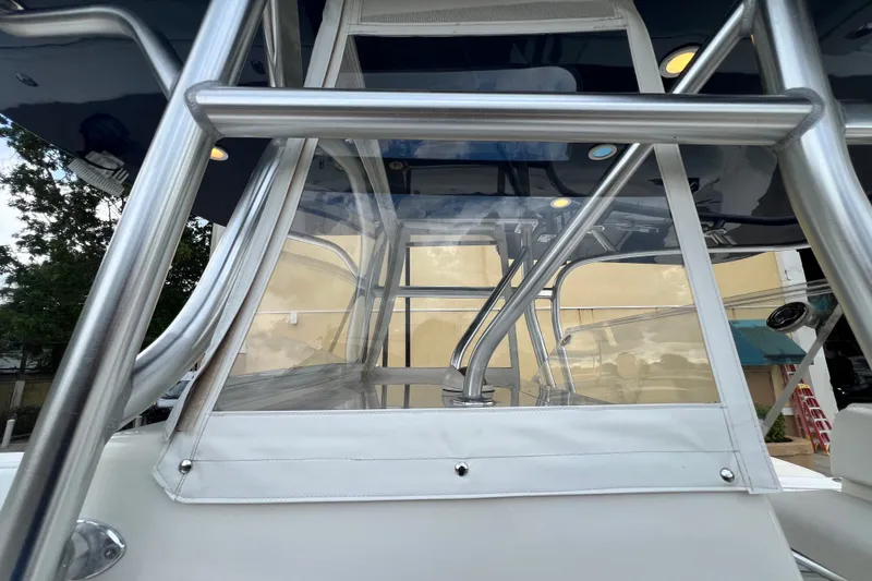 Slide: The Image of 2007 SeaVee 340B Open boat with stainless steel frame and clear enclosure. - 95