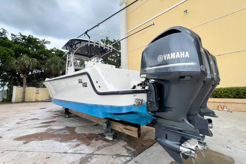 Slide: The Image of 2007 SeaVee 340B Open boat with Yamaha engines, docked outdoors. - 15