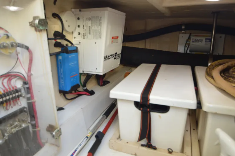 Slide: The Image of Electrical system and storage area inside a 2012 North Pacific Yachts 43. - 87
