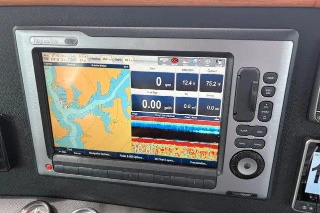 Slide: The Image of Navigation system display on 2012 North Pacific Yachts 43, showing map and engine data. - 19