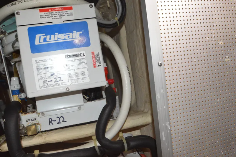 Slide: The Image of Cruisair unit in 2012 North Pacific Yachts 43, labeled R-22 refrigerant. - 90