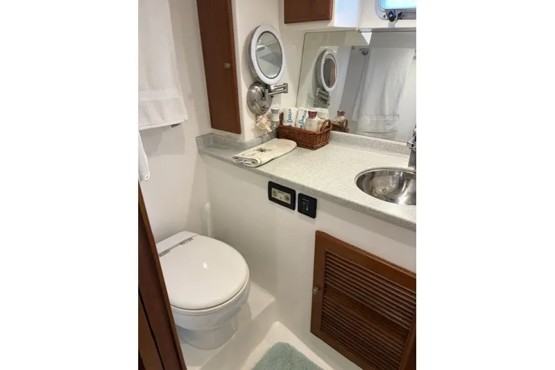 Slide: The Image of Bathroom interior of 2012 North Pacific Yachts 43, featuring sink and toilet. - 26