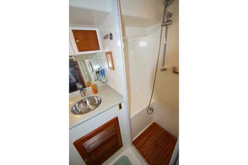 Slide: The Image of Bathroom interior of 2012 North Pacific Yachts 43, featuring sink and shower. - 81