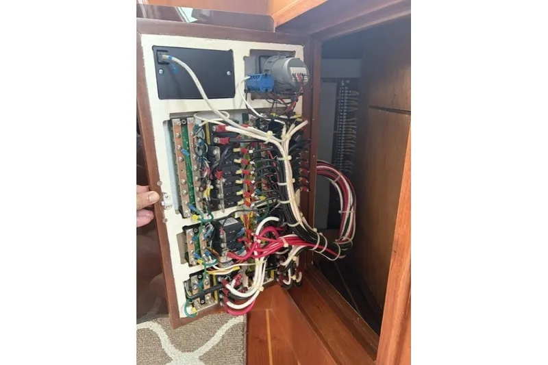 Slide: The Image of Electrical panel with wiring inside a 2012 North Pacific Yachts 43 model. - 14