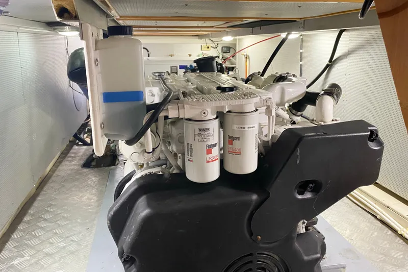Slide: The Image of Engine room of a 2012 North Pacific Yachts 43, showcasing detailed machinery components. - 23