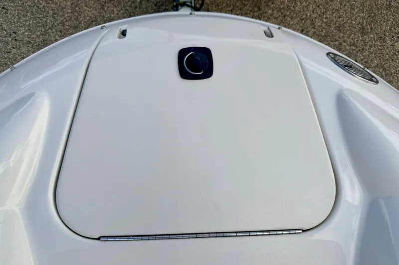 Slide: The Image of Bow of 2000 Sea Ray 210 Sundeck boat, featuring sleek white design. - 62
