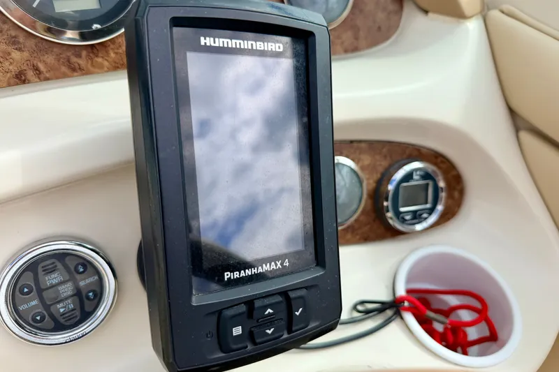 Slide: The Image of Humminbird PiranhaMAX 4 fish finder on 2000 Sea Ray 210 Sundeck dashboard. - 38