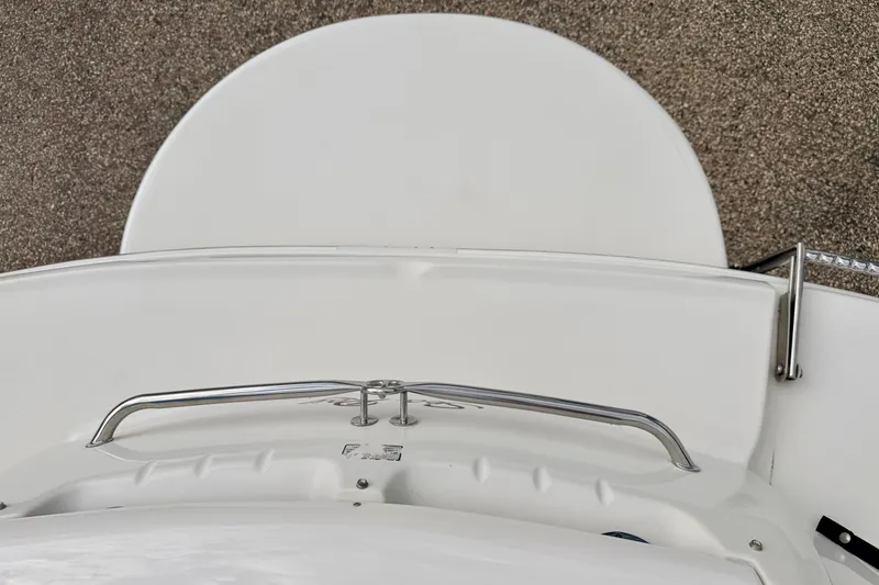 Slide: The Image of Bow view of a 2000 Sea Ray 210 Sundeck with stainless steel railings. - 20