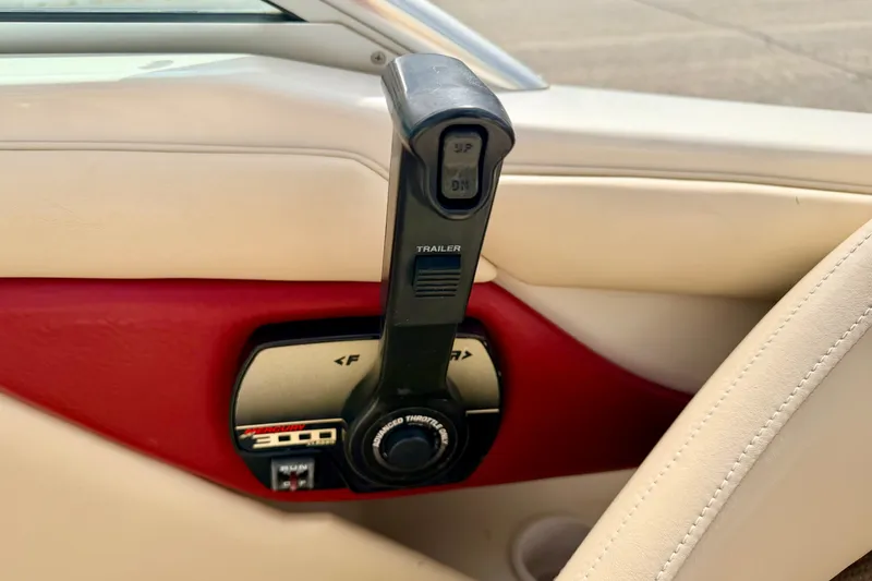 Slide: The Image of Throttle control of a 2000 Sea Ray 210 Sundeck boat, featuring a Mercury 300 system. - 41