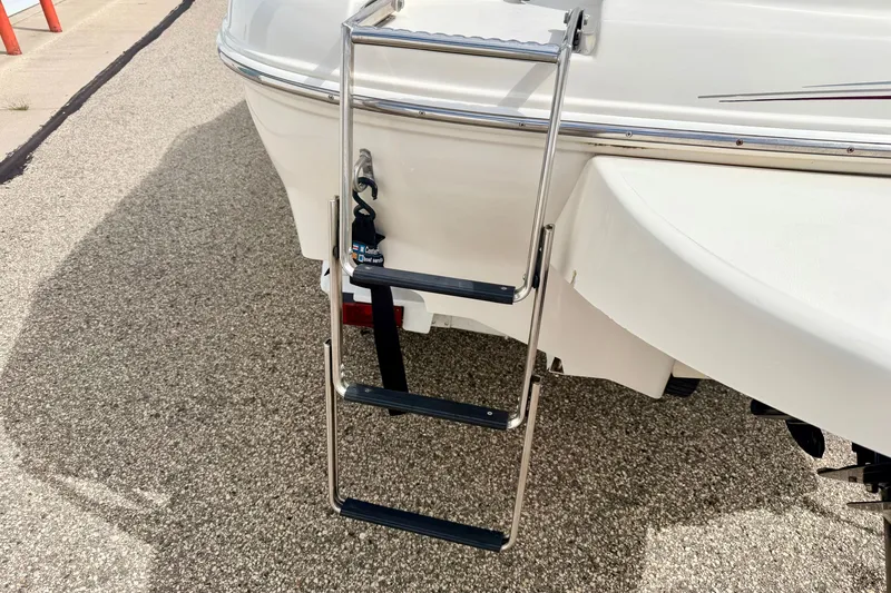 Slide: The Image of Stainless steel swim ladder on a 2000 Sea Ray 210 Sundeck boat. - 19