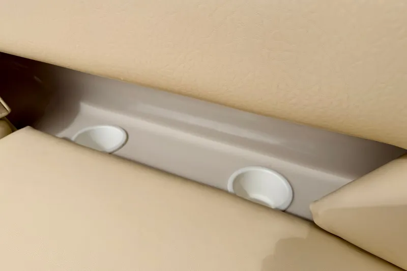 Slide: The Image of Close-up of beige seating on a 2000 Sea Ray 210 Sundeck boat. - 32