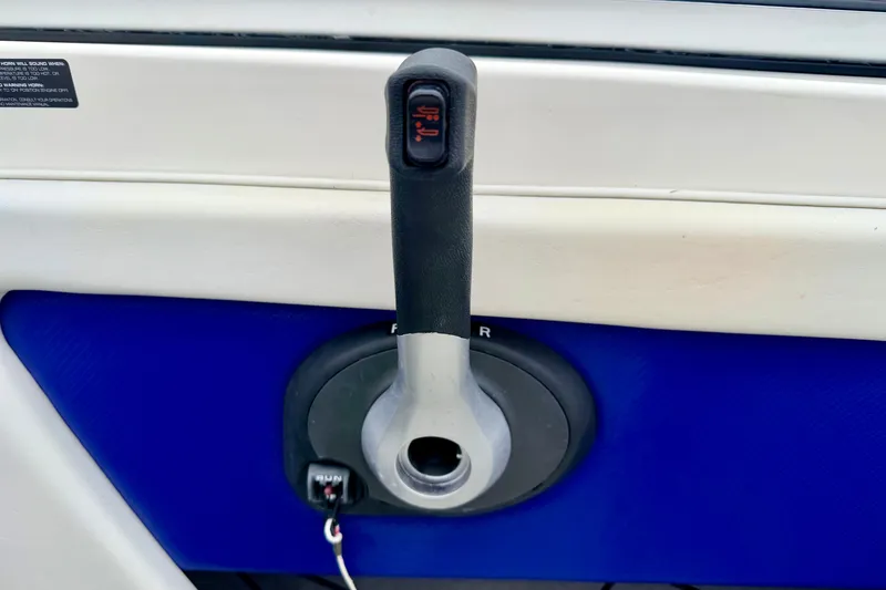 Slide: The Image of Throttle control lever on a 2007 Bayliner 195 Discovery boat. - 34