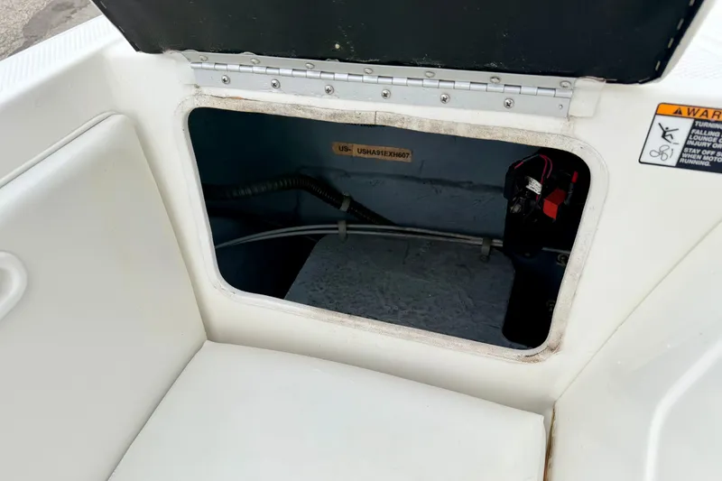 Slide: The Image of Open storage compartment on a 2007 Bayliner 195 Discovery boat. - 22