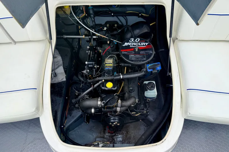Slide: The Image of Engine compartment of a 2007 Bayliner 195 Discovery with a 3.0L Mercury MerCruiser engine. - 28