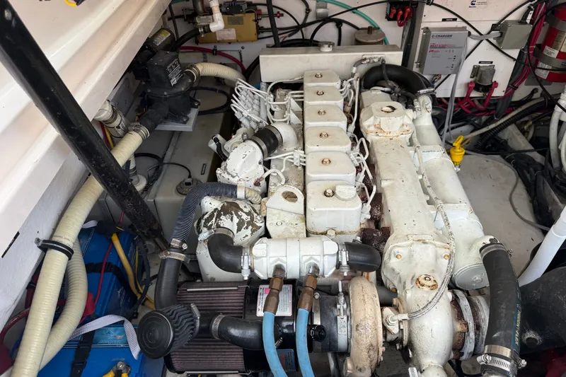 Slide: The Image of Engine compartment of a 2003 Tiara Yachts 3500 Open, showcasing detailed mechanical components. - 31