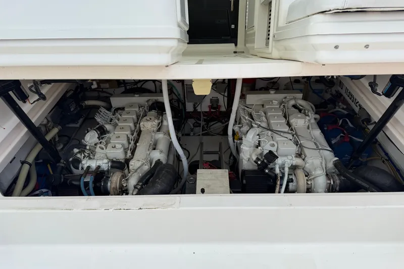 Slide: The Image of Engine compartment of a 2003 Tiara Yachts 3500 Open, showcasing dual engines. - 32
