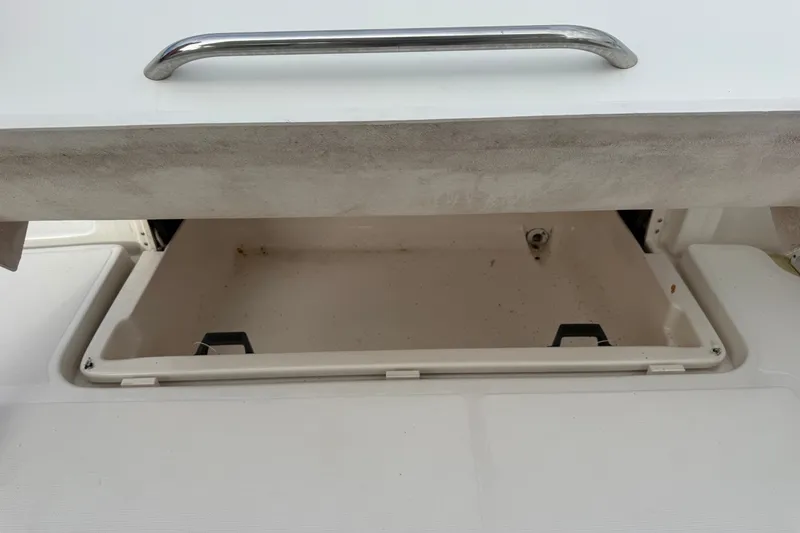 Slide: The Image of Open storage compartment on a 2003 Tiara Yachts 3500 Open boat. - 12