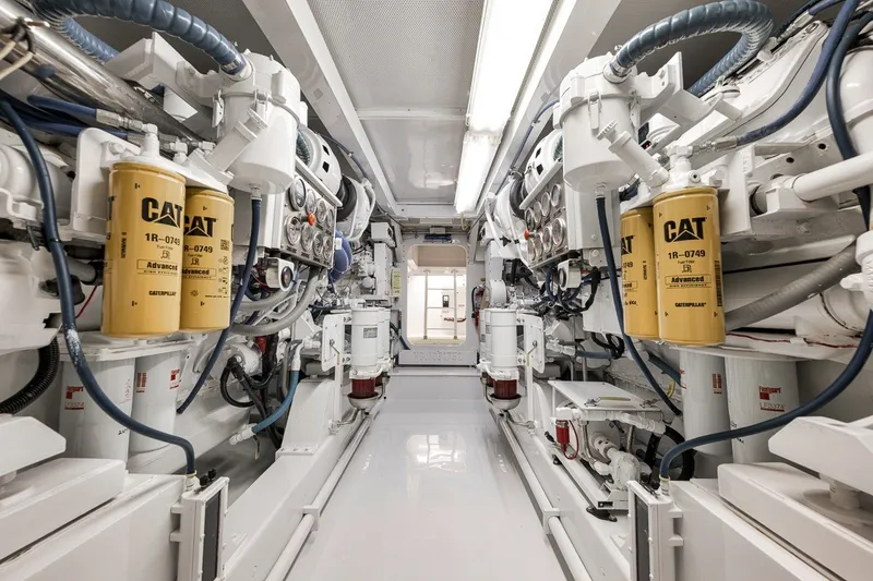 Slide: The Image of Engine room of a 1995 Merritt 65 Sport Fish boat with Caterpillar components. - 33