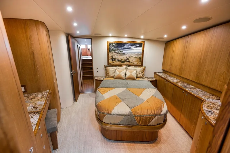 Slide: The Image of Luxurious cabin interior of 1995 Merritt 65 Sport Fish yacht with elegant wood finishes. - 47