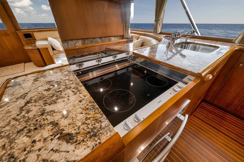 Slide: The Image of Luxurious kitchen interior on 1995 Merritt 65 Sport Fish yacht with ocean view. - 41