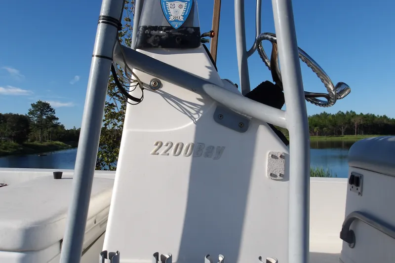 Slide: The Image of 2008 Ranger 2200 Bay boat console with scenic lake background. - 13