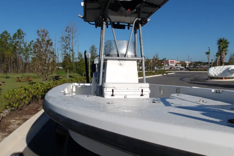 Slide: The Image of 2008 Ranger 2200 Bay Ranger boat parked outdoors on a sunny day. - 7