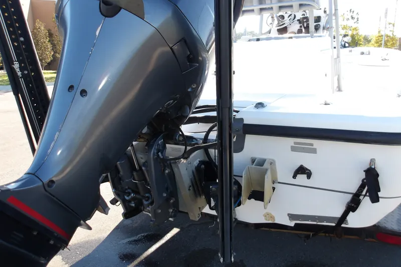 Slide: The Image of 2008 Ranger 2200 Bay Ranger boat with outboard motor and accessories. - 11