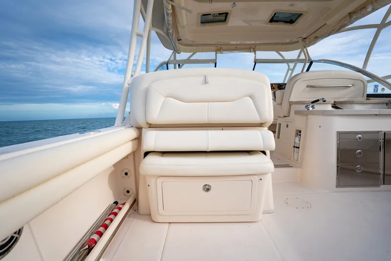 Slide: The Image of 2015 Grady-White Freedom 335 boat interior with seating and ocean view. - 39