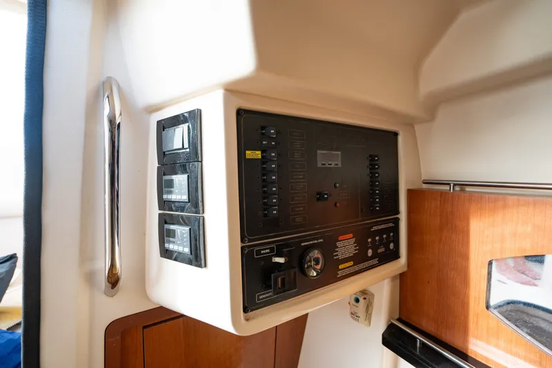 Slide: The Image of Control panel of a 2015 Grady-White Freedom 335 boat interior. - 51