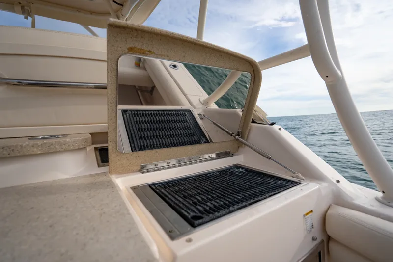 Slide: The Image of Grady-White Freedom 335 boat grill area with ocean view, 2015 model. - 36