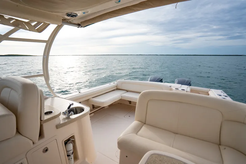 Slide: The Image of Luxurious 2015 Grady-White Freedom 335 boat interior with ocean view. - 56