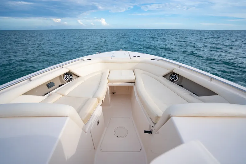 Slide: The Image of 2015 Grady-White Freedom 335 boat interior with ocean view and comfortable seating. - 47