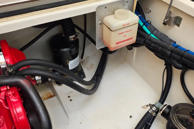 Slide: The Image of Engine compartment of a 2007 Boston Whaler 305 Conquest with Westerbeke coolant system. - 56