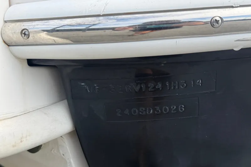 Slide: The Image of 2014 Sea Ray 240 Sundeck hull identification number on boat exterior. - 86