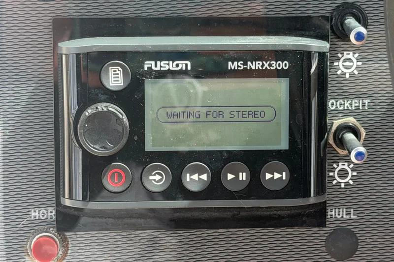 Slide: The Image of Fusion MS-NRX300 stereo display on 2014 Sea Ray 240 Sundeck boat dashboard. - 34
